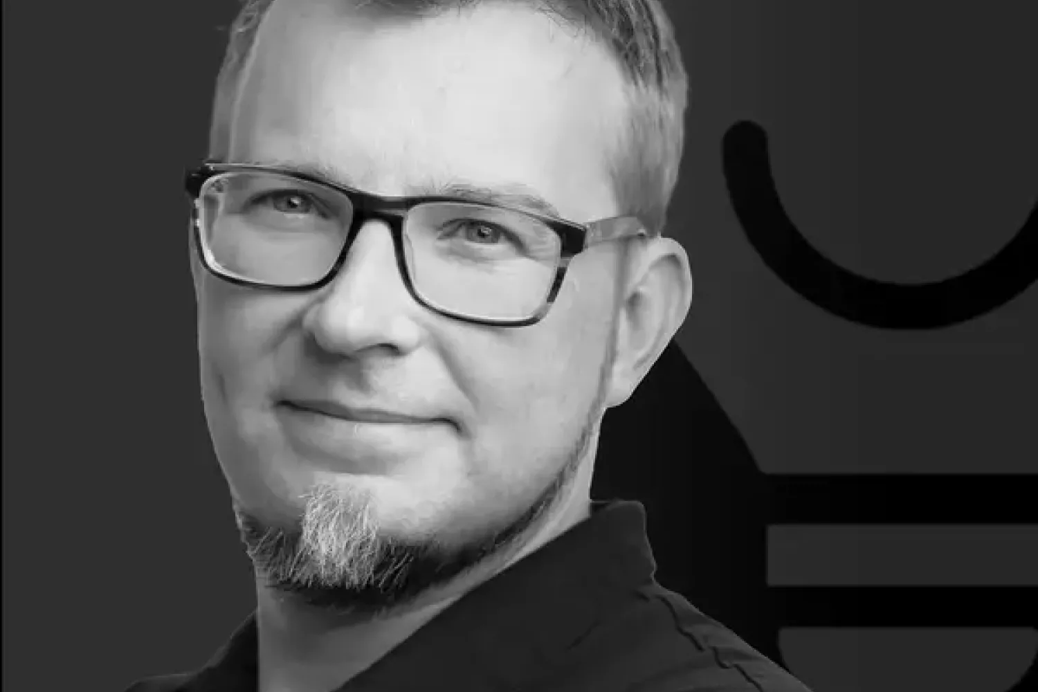 blonde woman with sunglasses laughing as she looks to her right