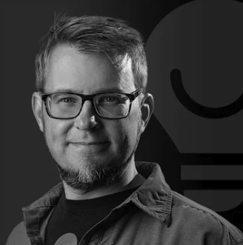 Black-and-white portrait of a Lightapalooza team member, David Warfel