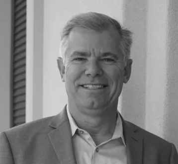 Black-and-white portrait of a Lightapalooza team member,  Kevin Berg