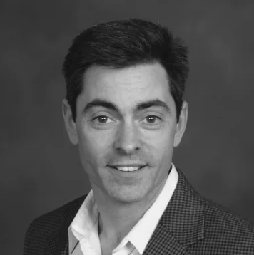 Black-and-white portrait of a Lightapalooza team member, Peter Romaniello